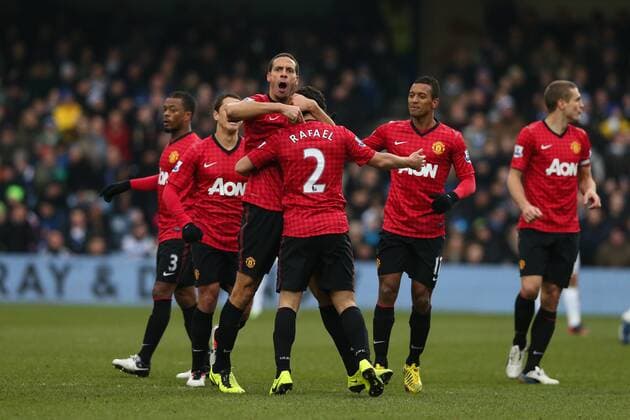 Football - 2012 2013 Premier League - Queens Park Rangers vs. Manchester United (ManU) Manchester United (ManU) s Rafael celebrates scoring with Manchester United (ManU) s Rio Ferdinand at Loftus Road, London 