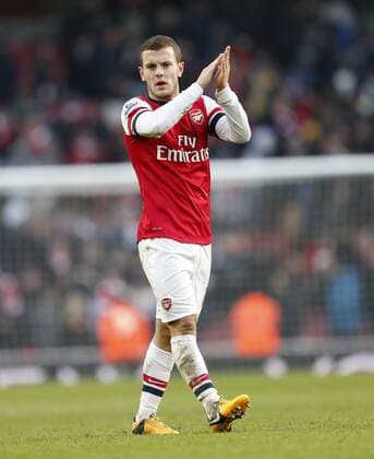 Arsenal FC London s Jack Wilshere applauds the fans at the final whistle..Arsenal FC London v Aston Villa - Premier League - Emirates Stadium, London- 23 02 13 - EDITORIAL USE ONLY. No use with unauthorised audio, video, data, fixture lists, club league logos or live services. Online in-match use limited to 120 images, no video emulation. No use in betting, games or single club league player publications.