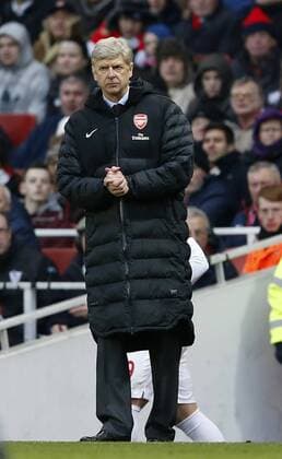 Arsenal FC London s Arsene Wenger looks on ..Arsenal FC London v Aston Villa - Premier League - Emirates Stadium, London- 23 02 13 - EDITORIAL USE ONLY. No use with unauthorised audio, video, data, fixture lists, club league logos or live services. Online in-match use limited to 120 images, no video emulation. No use in betting, games or single club league player publications.