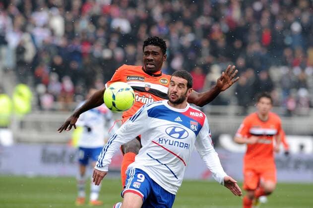 Lisandro Lopez (Lyon) Bruno Ecuele Manga (Lorient) FOOTBALL : Olympique Lyon vs FC Lorient - Ligue 1 - 24 02 2013 NLeGouic FEP Panoramic 