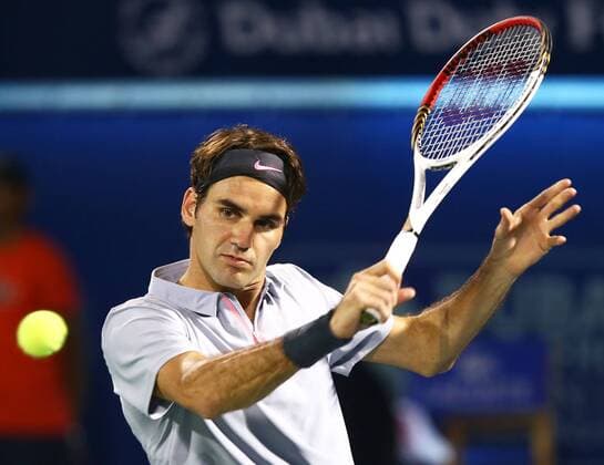 Dubai Tennis Championships 2013, ATP Tennis Herren Tennis Turnier,International Series,Dubai Tennis Stadium, U.A.E.,Roger Federer (SUI),Aktion,Einzelbild, Halbkoerper,Querformat,
