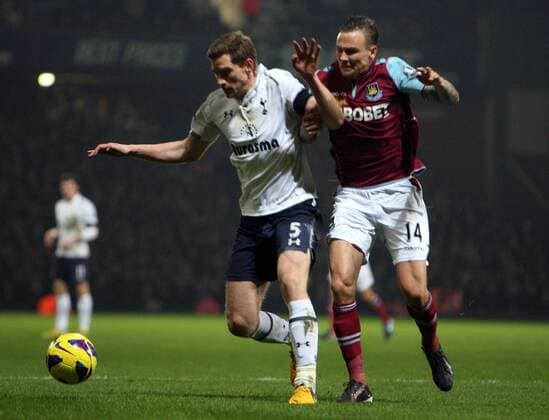 25.02.2013. London, England. Jan Vertonghen of Tottenham Hotspur and Matthew Taylor of West Ham United during the Premier League game between West Ham United and Tottenham Hotspur from Boleyn Ground, Upton Park xKieranxGalvinx  ActionPlus20220018