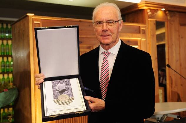 MUNICH, GERMANY - FEBRUARY 27: Franz Beckenbauer poses with his award during the UEFA President s Award at Suedtiroler Stuben on February 27, 2013 in Munich, Germany. Local Caption Franz Beckenbauer - Poolfoto
