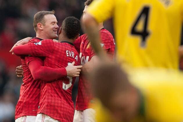 Football - 2012 2013 Premier League - Manchester United (ManU) vs. Norwich City - Wayne Rooney of Manchester United (ManU) celebrates his goal at Old Trafford 