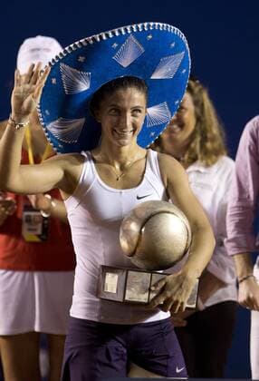 Italy s Sara Errani holds her trophy during the awarding ceremony after the women s singles final match at the Mexican Open Tennis Tournament held in Acapulco, State of Guerrero, Mexico, on Mar. 2, 2013. Errani won the match 2-0. (Xinhua Bao Feifei) (da) MEXICO-ACAPULCO-TENNIS-OPEN 