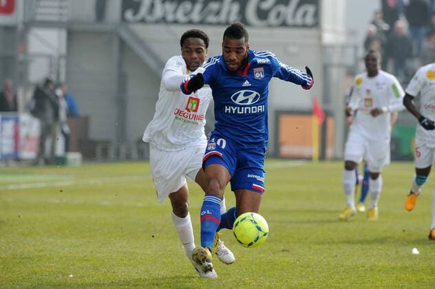 Tripy Makonda (Brest) Alexandre Lacazette (Lyon) FOOTBALL : Brest vs Lyon - Ligue 1 - 03 03 2013 N.LeGouic FEP Panoramic 