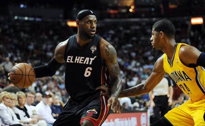 March 10, 2013 - Miami, FL, USA - LeBron James of the Miami Heat looks for an opening to the basket against Paul George of the Indiana Pacers at the AmericanAirlines Arena in Miami, Florida, Sunday, March 10, 2013. Heat vs. Pacers - ZUMAm67