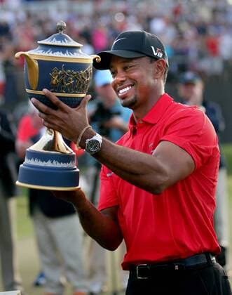 March 10, 2013 - Doral, Florida, U.S. - TIGER WOODS holds up the Gene Sarazen Cup after winning the World Golf Championships Cadillac Championship at the Trump Doral Golf Club and Resort on Sunday. The victory at TPC Blue Monster is Woods 76th PGA Golf Herren Tour win. PGA Golf Herren 2013 - Woods Wins Doral World Golf Championships - ZUMAm67