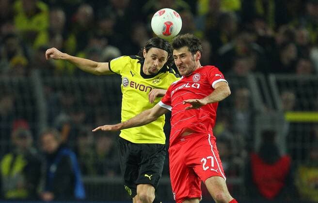 Dienstag 27.11.2012, 1. Fussball - Bundesliga Saison 12 13 - 14. Spieltag in Dortmund, BV Borussia Dortmund - Fortuna Düsseldorf, Neven Subotic (BVB) gegen Stefan Reisinger (F95) DeFodi018