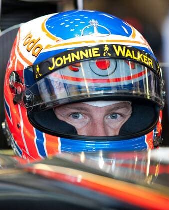(130315) -- MELBOURNE, March 15, 2013 (Xinhua) -- McLaren driver Jenson Button of Britain reacts during the first practice session of the Australian F1 Grand Prix in Melbourne, Australia, March 15, 2013. (Xinhua Bai Xue) AUSTRALIA-MELBOURNE-F1-PRACTICE SESSION 