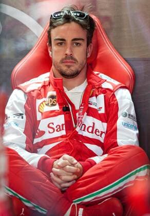 (130315) -- MELBOURNE, March 15, 2013 (Xinhua) -- Ferrari driver Fernando Alonso of Spain reacts during the first practice session of the Australian F1 Grand Prix in Melbourne, Australia, March 15, 2013. (Xinhua Bai Xue) AUSTRALIA-MELBOURNE-F1-PRACTICE SESSION 