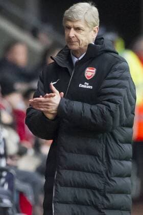 Football - 2012 2013 Premier League - Swansea City vs. Arsenal FC London 0:2 - Arsene Wenger applauds his team.