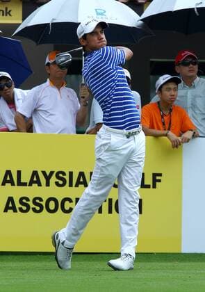 21.03.2013 Kuala Lumpur, Malaysia. Matteo Manassero of Italy hits his driver at the 10th tee during day one of the the Maybank Malaysia Open Golf Tournament at the Kuala Lumpur Golf and Country Club. xMegatxFirdausx  ActionPlus11389255