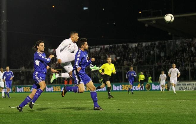England s Alex Oxlade-Chamberlain hits the bar..San Marino v England- World Cup Qualifier - Stadio di Serravalle, Serravalle- 22 03 13 - Picture David Klein Sportimage EDITORIAL USE ONLY. No use with unauthorised audio, video, data, fixture lists, club league logos or live services. Online in-match use limited to 120 images, no video emulation. No use in betting, games or single club league player publications.