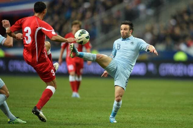 Mathieu Valbuena (fra) - Dato Kvirkvelia (geo) FOOTBALL : France vs Georgie - qualification coupe du monde 2014 - 22 03 2013 AnthonyBIBARD FEP Panoramic 