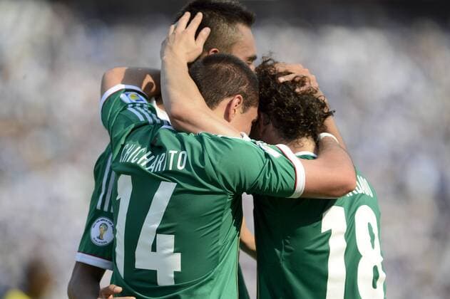 (130323) -- SAN PEDRO SULA, March 22, 2013 (Xinhua) -- Mexico s players celebrate after scoring during the Brazil-2014 FIFA World Cup CONCACAF soccer qualifier match against Honduras at Olimpico Metropolitano stadium in San Pedro Sula, Honduras, on March 22, 2013. The match ended with a 2-2 draw. (Xinhua StraffonImages) (mp) HONDURAS-SAN PEDRO SULA-HONDURAS VS MEXICO 