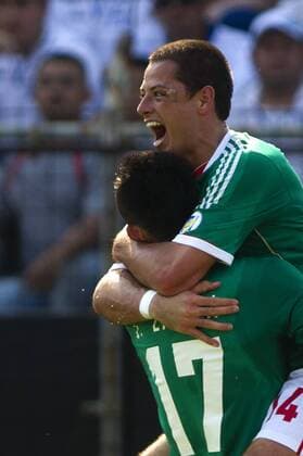 (130323) -- SAN PEDRO SULA, March 22, 2013 (Xinhua) -- Mexico s Javier CHICHARITO Hernandez (R) celebrates after scoring during the Brazil-2014 FIFA World Cup CONCACAF soccer qualifier match against Honduras at Olimpico Metropolitano stadium in San Pedro Sula, Honduras, on March 22, 2013. The match ended with a 2-2 draw. (Xinhua StraffonImages) (mp) HONDURAS-SAN PEDRO SULA-HONDURAS VS MEXICO 