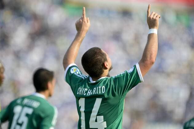 (130323) -- SAN PEDRO SULA, March 22, 2013 (Xinhua) -- Mexico s Javier CHICHARITO Hernandez (R) celebrates after scoring during the Brazil-2014 FIFA World Cup CONCACAF soccer qualifier match against Honduras at Olimpico Metropolitano stadium in San Pedro Sula, Honduras, on March 22, 2013. The match ended with a 2-2 draw. (Xinhua StraffonImages) (mp) HONDURAS-SAN PEDRO SULA-HONDURAS VS MEXICO 