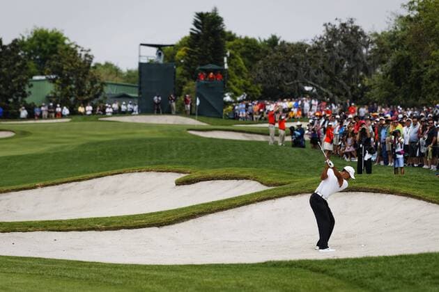 March 23, 2013 - Orlando, Florida, U.S - TIGER WOODS takes his second shot from a bunker on the first hole during the third round of the Arnold Palmer Invitational at the Bay Hill Club and Lounge in Orlando, Fl. Golf 2013 - Arnold Palmer Invitational - Round Three  - ZUMArno