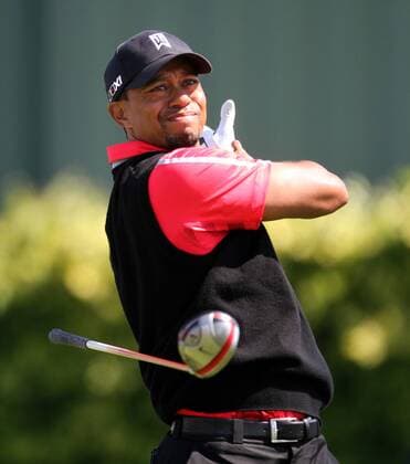 March 25, 2013 - Orlando, Florida, U.S. - TIGER WOODS loses his grip on his club during his tee shot off the ninth hole during the final round of the Arnold Palmer Invitational in Orlando on Monday. Golf 2013 - Woods Wins Arnold Palmer Invitational - ZUMAm67