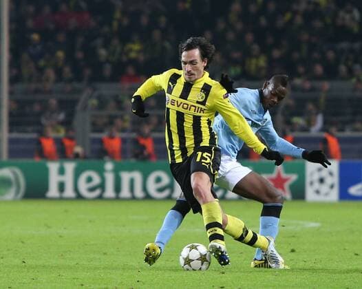 04.12.2012, UEFA Champions League, Borussia Dortmund - Manchester City v.l. Mats Hummels (Borussia Dortmund), Mario Balotelli (Manchester City FC)