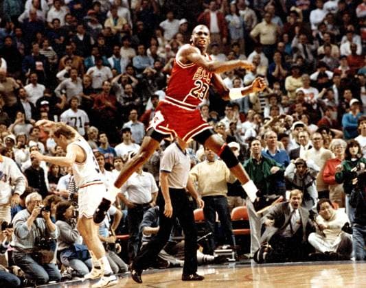 April 17, 2003 - Cleveland, OH, USA - The Chicago Bulls Michael Jordan reacts after hitting the game-winning basket over Cleveland s Craig Ehlo, left rear, in Game 5 of the NBA Basketball Herren USA playoffs May 7, 1989, in Cleveland, Ohio. Michael Jordan celebrates  - ZUMAn c
