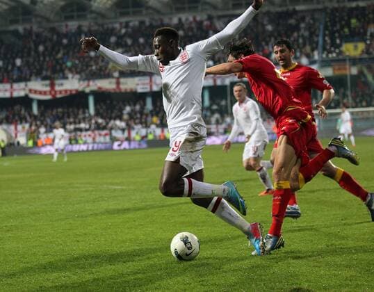 England s Danny Welbeck gets booked for diving..Montenegro v England- World Cup Qualifier - Podgorica City Stadium, Podgorica- 26 03 13 - Picture David Klein Sportimage EDITORIAL USE ONLY. No use with unauthorised audio, video, data, fixture lists, club league logos or live services. Online in-match use limited to 120 images, no video emulation. No use in betting, games or single club league player publications.