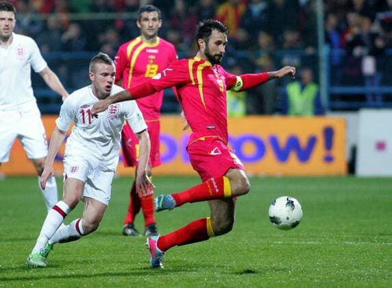 26.03.2013 Podgorica(Montenegro) Montenegro-England FIFA world cup Brazil qualifiers men football Tom Cleverley(L) England and Mirko Vucinic(R) Montenegro : 