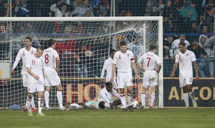 England s Steven Gerrard looks on dejected after going 1-1..Montenegro v England- World Cup Qualifier - Podgorica City Stadium, Podgorica- 26 03 13 - Picture David Klein Sportimage EDITORIAL USE ONLY. No use with unauthorised audio, video, data, fixture lists, club league logos or live services. Online in-match use limited to 120 images, no video emulation. No use in betting, games or single club league player publications.