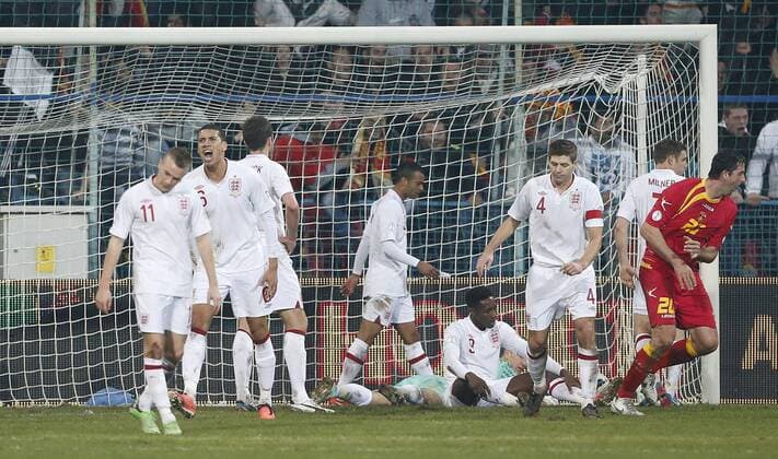 England s Steven Gerrard looks on dejected after going 1-1..Montenegro v England- World Cup Qualifier - Podgorica City Stadium, Podgorica- 26 03 13 - Picture David Klein Sportimage EDITORIAL USE ONLY. No use with unauthorised audio, video, data, fixture lists, club league logos or live services. Online in-match use limited to 120 images, no video emulation. No use in betting, games or single club league player publications.