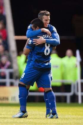 Football - 2012 2013 Premier League - Sunderland vs. Manchester United Robin van Persie of Manchester United celebrates his opening goal with Anderson at the Stadium of Light 