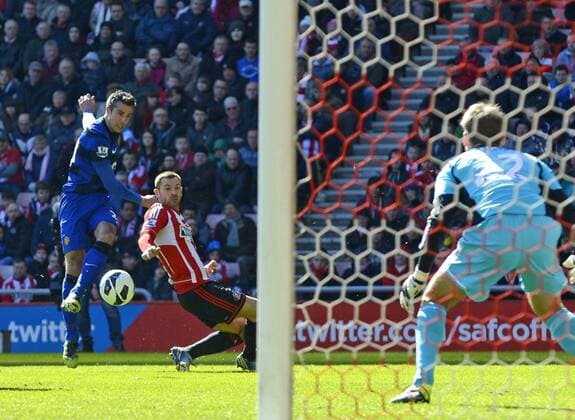 Robin Van Persie of Manchester United (L) scores their first goal - Barclays Premier League - Sunderland vs Manchester United - Stadium of Light - Sunderland - 30 03 13 - Picture Richard Lee Sportimage EDITORIAL USE ONLY. No use with unauthorised audio, video, data, fixture lists, club league logos or live services. Online in-match use limited to 120 images, no video emulation. No use in betting, games or single club league player publications.