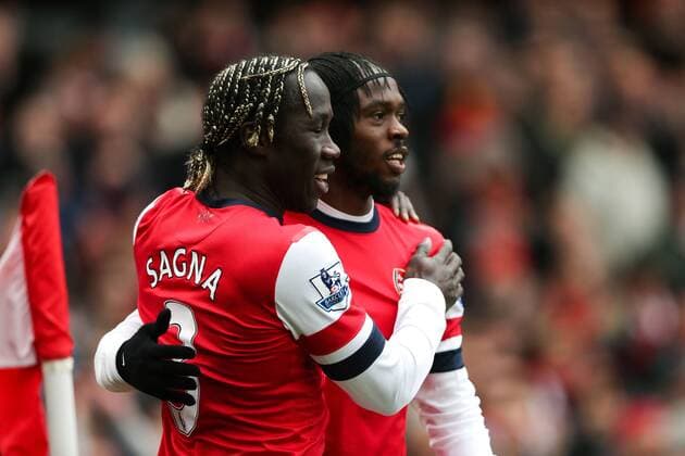 Football - 2012 2013 Premier League - Arsenal FC London - Reading FC; Gervinho of Arsenal celebrates his goal with Bacary Sagna of Arsenal at the Emirates Stadium 