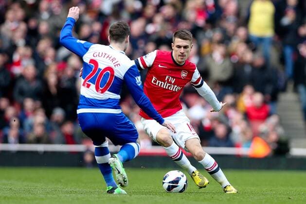 Football - 2012 2013 Premier League - Arsenal FC London - Reading FC; Aaron Ramsey of Arsenal and Reading s Danny Gutherie at the Emirates Stadium 