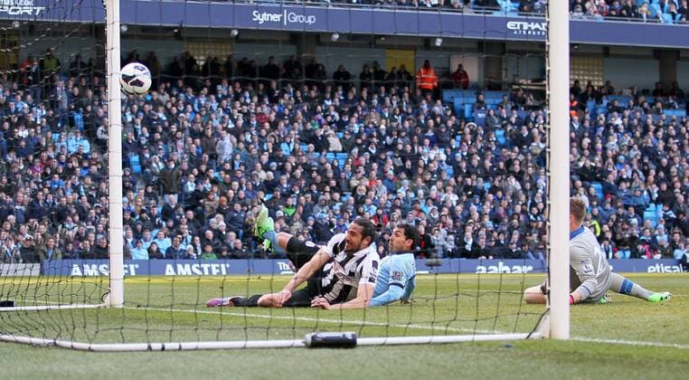 Manchester City s Carlos Tevez scoring his sides opening goal..Manchester City v Newcastle United- Barclays Premier League - City Of Manchester Stadium, Manchester- 30 03 13 - Picture David Klein Sportimage EDITORIAL USE ONLY. No use with unauthorised audio, video, data, fixture lists, club league logos or live services. Online in-match use limited to 120 images, no video emulation. No use in betting, games or single club league player publications.