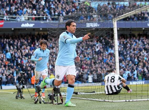 Manchester City s Carlos Tevez celebrates scoring his sides opening goal..Manchester City v Newcastle United- Barclays Premier League - City Of Manchester Stadium, Manchester- 30 03 13 - Picture David Klein Sportimage EDITORIAL USE ONLY. No use with unauthorised audio, video, data, fixture lists, club league logos or live services. Online in-match use limited to 120 images, no video emulation. No use in betting, games or single club league player publications.
