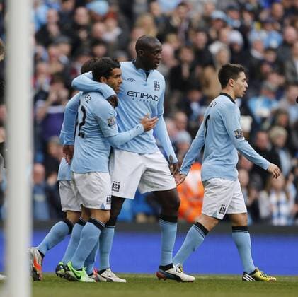 Manchester City s Yaya Toure celebrates scoring his sides fourth goal..Manchester City v Newcastle United- Barclays Premier League - City Of Manchester Stadium, Manchester- 30 03 13 - Picture David Klein Sportimage EDITORIAL USE ONLY. No use with unauthorised audio, video, data, fixture lists, club league logos or live services. Online in-match use limited to 120 images, no video emulation. No use in betting, games or single club league player publications.