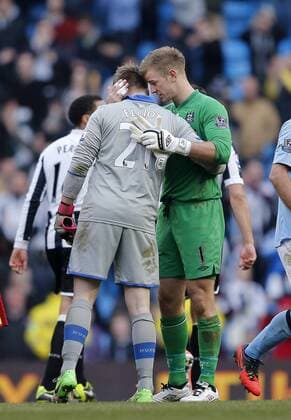 Manchester City s Joe Hart congratulates Newcastle s Rob Elliot..Manchester City v Newcastle United- Barclays Premier League - City Of Manchester Stadium, Manchester- 30 03 13 - Picture David Klein Sportimage EDITORIAL USE ONLY. No use with unauthorised audio, video, data, fixture lists, club league logos or live services. Online in-match use limited to 120 images, no video emulation. No use in betting, games or single club league player publications.
