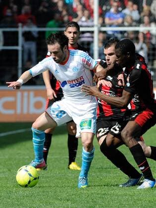 Mathieu Valbuena ( OM ) - Alexy Bosetti - Romain Genevois ( NICE ) FOOTBALL : OGC Nice vs Olympique de Marseille . - Ligue 1 - 31 03 2013 OlivierAnrigo Panoramic 