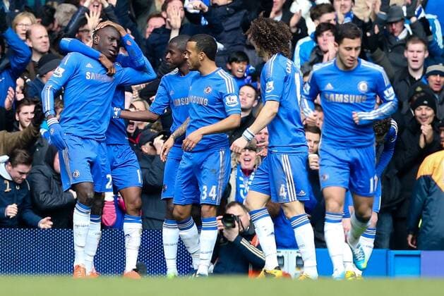 Demba Ba of Chelsea celebrates scoring with his team mates - Chelsea vs Manchester Utd - FA Cup Quarter-Final replay - Stamford Bridge Stadium - London - 1st April 2013 - Pic Charlie Forgham-Bailey Sportimage EDITORIAL USE ONLY. No use with unauthorised audio, video, data, fixture lists, club league logos or live services. Online in-match use limited to 120 images, no video emulation. No use in betting, games or single club league player publications.