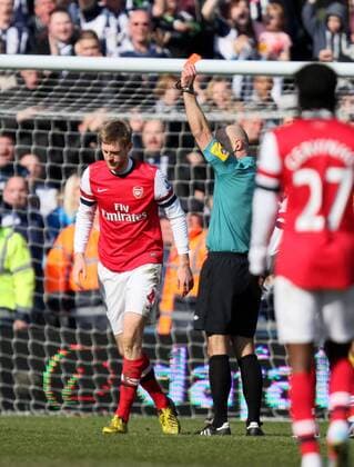 Pic: Paul Marriott . . West Bromwich Albion v Arsenal . . 06.04.13 Per Mertesacker (A) is given a red card by referee Howard Webb. 