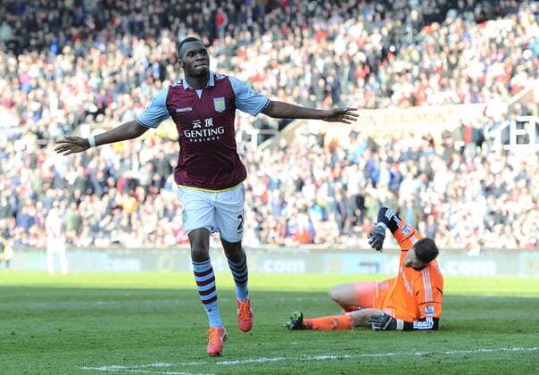Christian Benteke of Aston Villa celebrates scoring the third goal - Barclays Premier League - Stoke City vs Aston Villa - Britannia Stadium - Stoke on Trent - England - 06 04 13 - Picture Simon Bellis Sportimage EDITORIAL USE ONLY. No use with unauthorised audio, video, data, fixture lists, club league logos or live services. Online in-match use limited to 120 images, no video emulation. No use in betting, games or single club league player publications.