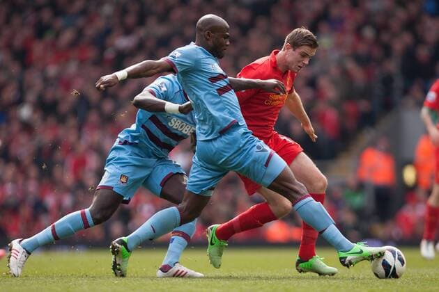 Football - 2012 2013 Premier League. Liverpool FC - West Ham United, West Ham s Mohamed Diame challenges Jordan Henderson of Liverpool at Anfield 