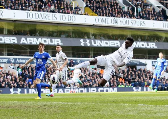 Tottenham s Emmanuel Adebayor scoring his sides opening goal.. Tottenham Hotspur - Everton FC. Barclays Premier League - White Hart Lane, London- 07 04 13 - EDITORIAL USE ONLY. No use with unauthorised audio, video, data, fixture lists, club league logos or live services. Online in-match use limited to 120 images, no video emulation. No use in betting, games or single club league player publications.