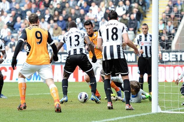 Football - Premier League - Newcastle United vs. FC Fulham: Tim Krul (Newcastle goalkeeper) makes a point blank save at St James Park. 