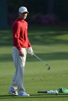Martin Kaymer of Germany prepares to drive on the driving range during a practice round before the Masters golf tournament at Augusta National Golf Club on April 8, 2013 in Augusta, Georgia. The 77th Masters tournament will begin on Thursday.  AUG20130408312