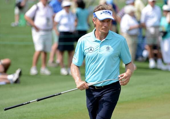 German Bernhard Langer lines up a shot on the 9th green during a practice round before the Masters golf tournament at Augusta National Golf Club on April 8, 2013 in Augusta, Georgia. The 77th Masters tournament will begin on Thursday.  AUG20130408320