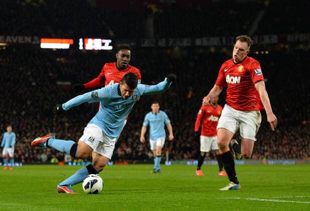 Sergio Aguero of Manchester City scores - Barclays Premier League - Manchester Utd vs Manchester City - Old Trafford Stadium - Manchester- England - 08 04 13 - Picture Simon Bellis Sportimage EDITORIAL USE ONLY. No use with unauthorised audio, video, data, fixture lists, club league logos or live services. Online in-match use limited to 120 images, no video emulation. No use in betting, games or single club league player publications.