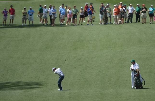 Rory McIlroy walks down the 7th fairway during a practice round before the Master golf tournament at Augusta National Golf Club on April 8, 2013 in Augusta, Georgia.  AUG20130408360