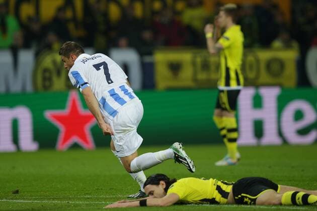 JOAQUIN, Joaquin SANCHEZ RODRIGUEZ (FC Malaga - 7) jubelt nach seinem Tor zum 0-1 Neven SUBOTIC (Borussia Dortmund - BVB - 4) am Boden - hinten Marco REUS (Borussia Dortmund - BVB - 11) ist enttäuscht, ist frustriert, frust, zeigt Emotionen EP_Schmit